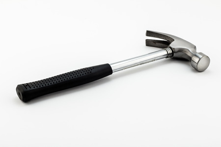 Iron hammer with black rubber grip isolated on white backgroundの写真素材