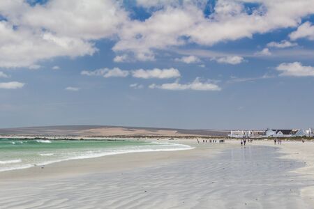 Paternoster, West Coast, South Africa - 22 December 2018: Small fishing holiday village with people walking on the low tide beach at Paternoster on the West Coast of South Africaのeditorial素材