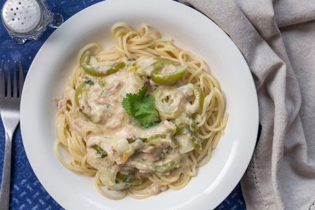 Creamy tuna pasta with green pepper - top view photograph
