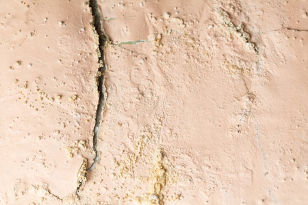 Abstract grunge textured wall with space  - cracked peeling paint wall background