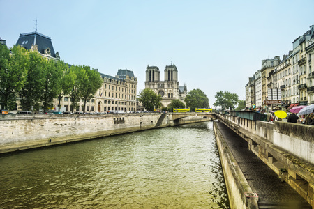 Seine river and main Facade of Notre Dame de Paris Cathedral, Paris, Franceのeditorial素材