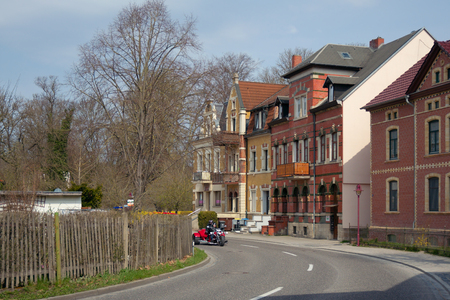 Bad Koesen Germany  April 11 2015: Houses and motor trike on Rudelsburgpromenade.のeditorial素材