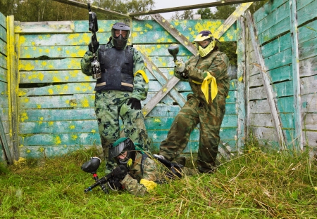 Paintball players in full gear at the shooting rangeの写真素材