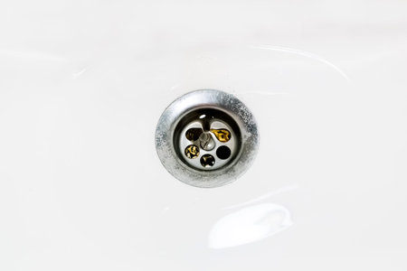 Water leaks in the drain hole in the sink