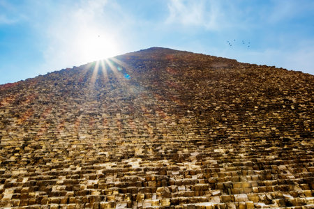 The pyramid of Cheops in Giza in the sunny day, Cairo, Egyptの写真素材