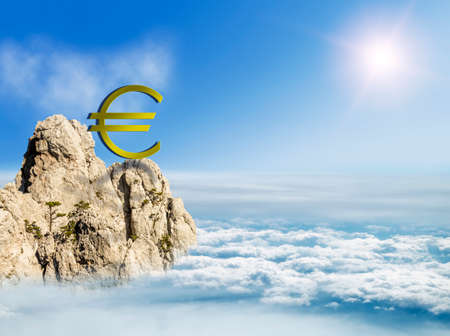 Euro sign on a mountain top among the clouds, business conceptの写真素材