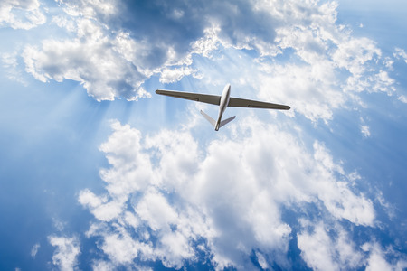 Unmanned aerial vehicle in the cloudy skyの写真素材