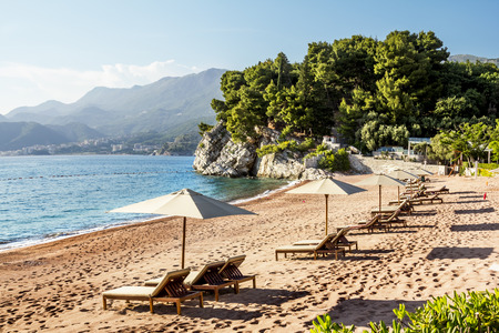 The beach adjacent to the island of Sveti Stefan in Montenegro in sunny dayのeditorial素材