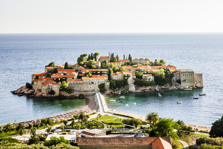 island-hotel of Sveti Stefan in Montenegro on a sunny summer dayのeditorial素材