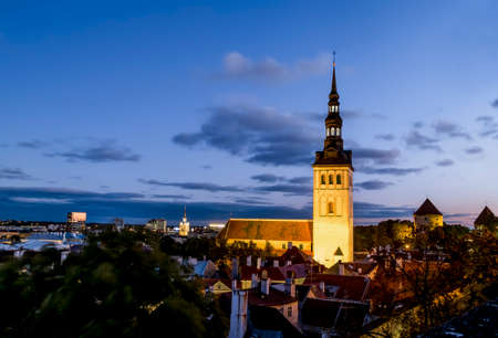View of  St Nicholas Church  in old Tallinn at evening illumination . Estoniaのeditorial素材