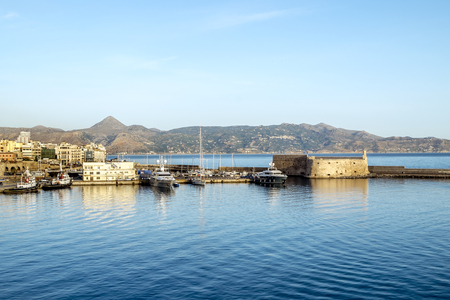 Heraklion.Greece.1 june, 2019. View of the fortress and ships in the port of Heraklion at sunriseのeditorial素材