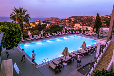 Agia Pelagia.Crete.May 30, 2019.View from "hotel & village Panorama" of the pool and resort in Agia Pelagia in Crete in Greece.のeditorial素材
