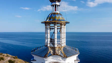 Malorechenskoye.Crimea. September 14, 2021. The bell tower of the Church of St. Nicholas lighthouse Crimean memorial to the victims on the watersのeditorial素材