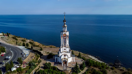 Malorechenskoe.Crimea.14 september 2021 Saint Nicholas Temple lighthouse Crimea memorial to victims on the watersのeditorial素材