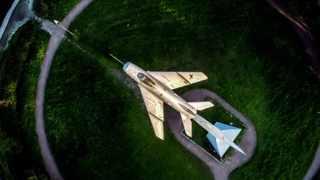 Saint-Petersburg.Russia.August 19,2021.Monument to military pilots stella with MIG19 fighter in...