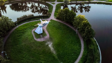 Saint-Petersburg.Russia.August 19,2021.Monument to military pilots stella with MIG19 fighter in...