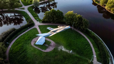 Saint-Petersburg.Russia.August 19,2021.Monument to military pilots stella with MIG19 fighter in...