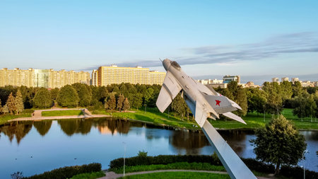 Saint-Petersburg.Russia.August 19,2021.Monument to military pilots stella with MIG19 fighter in...