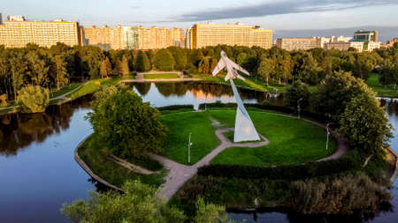 Saint-Petersburg.Russia.August 19,2021.Monument to military pilots stella with MIG19 fighter in Aviators park.のeditorial素材