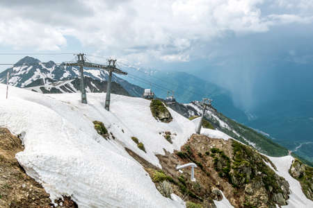 sochi. Russia. 2 june 2022. Cable car cabin rises up from Rosa Khutor village to Roza Peak mountain in Sochi resort city in Krasnodar Krai.のeditorial素材