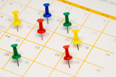 Pushpin on  calendar  for important date.の写真素材