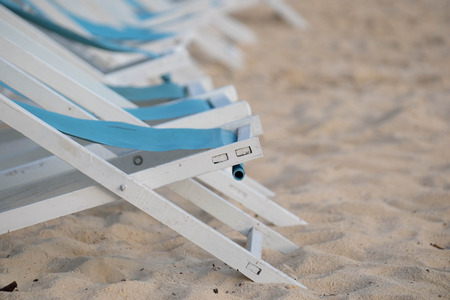 Blue camp bed on the beach with sand in background,Thailand.の写真素材