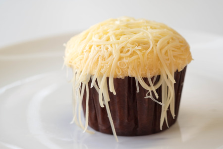 Souffle cup cheesecake on white plate.の写真素材