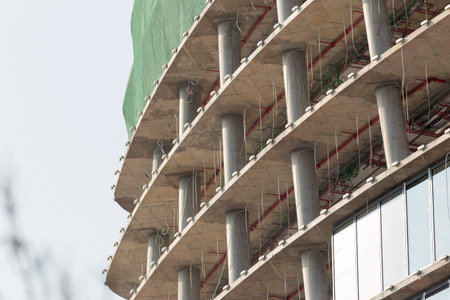 Skyscraper construction site detail, industry concepts