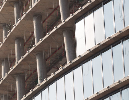 Skyscraper construction site detail, industry concepts
