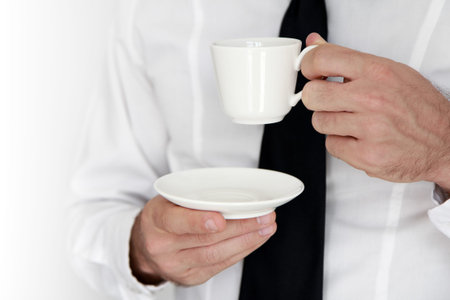 Businessman having a relaxed coffee breakの写真素材