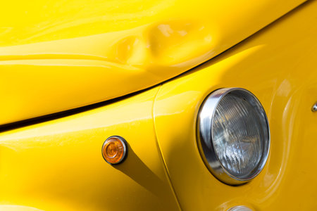 Old car bashed car body, vivid yellow color