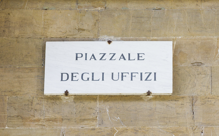 Old traditional road sign in Florence, Italyの写真素材