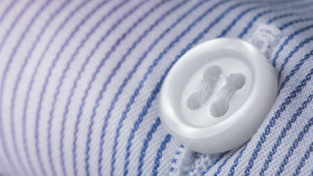 Elegant cotton shirt macro photo, textile industry backgroundの写真素材