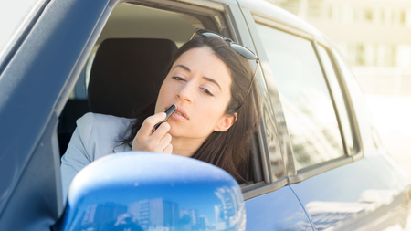 Woman, traffic and car problematic relationshipの写真素材