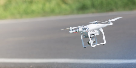 Quadcopter drone flying, technology and surveillance concepts