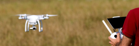 Quadcopter drone flying, technology and surveillance concepts