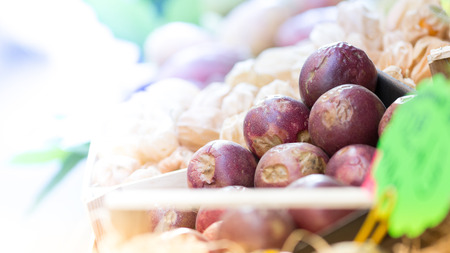Tropical fruit on sale in a street marketの写真素材