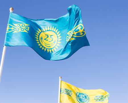Astana flags on a blue sky, Kazakhstan. Celebration of the founding of the city.の写真素材