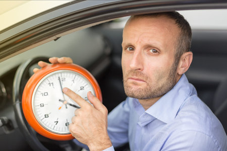 Businessman late stuck in traffic, road and commuter concepts