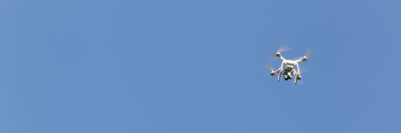 Quadcopter drone flying, technology and surveillance concepts