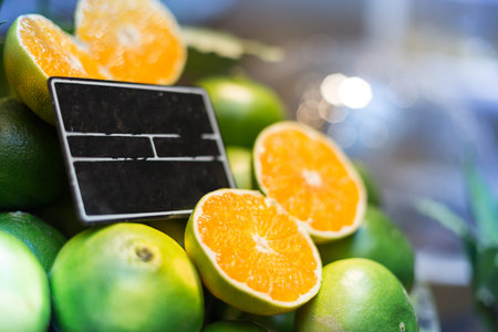 Citrus fruit display, street market photo