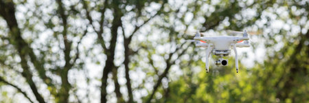 Quadcopter drone flying, technology and surveillance concepts