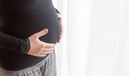 Pregnant woman, family and love theme