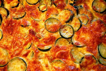 closeup of delicious zucchini casserole gratinated with cheeseの写真素材