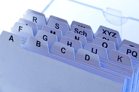 address file cards with alphabet in blue lightの写真素材