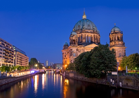 Berlin Dome after sunset with river spree and deep blue skyの写真素材