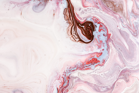 Swirls of marble or the ripples of agate. Liquid marble texture with pink, white and brown colors. Abstract painting background for wallpapers, posters, cards, invitations, websites. Fluid art.の写真素材