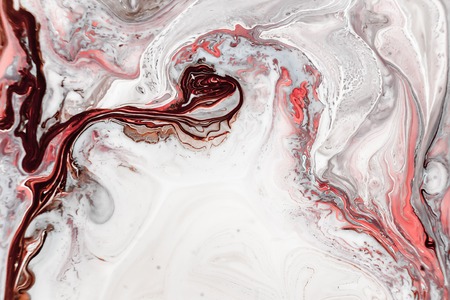 Abstract painting background for wallpapers, posters, cards, invitations, websites. Marbleized effect. Modern artwork with swirls of marble. Fluid art. Mixed white, blue, brown and pink paints.の写真素材