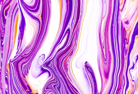 Mixture of acrylic paints. Modern artwork with spots and splashes of color paint. Liquid marble texture. Applicable for design packaging, labels, business cards, and interactive web backgroundsの写真素材