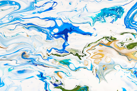 Hand painted background with mixed liquid blue, white, yellow paints. Abstract fluid acrylic painting. Applicable for packaging, invitation, textile, wallpaper, design of different surfacesの写真素材